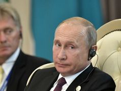 Дмитрий Песков и Владимир Путин. Фото: Алексей Никольский / РИА Новости